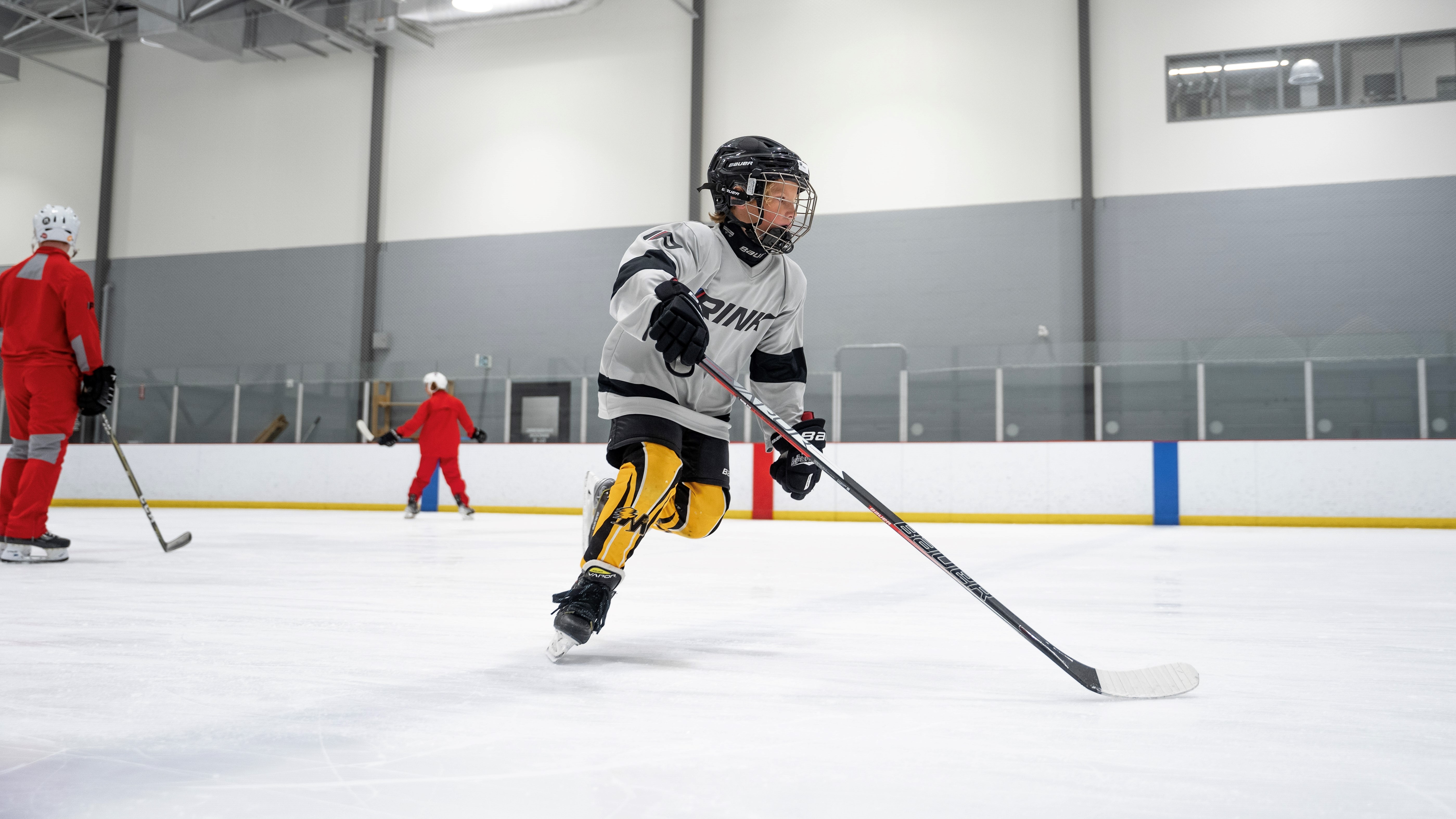 RINK Advanced Hockey Player Working On Power Skating Techniques